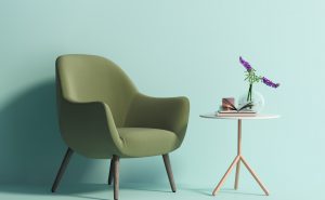 Rendering of a Contemporary green armchair on mint wall